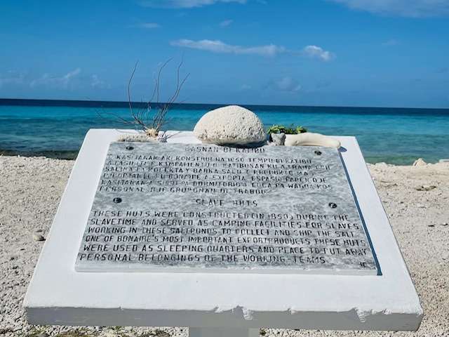BGray Bonaire slave homes memorial, explaining the hardships of slaves who worked in these salt fields.